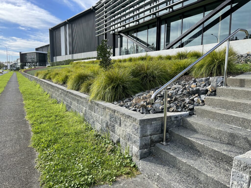 Tanika® Lomandra planting and gravel areas used to reduce run-off on a slope